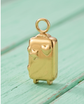 Charm Maleta Dorada