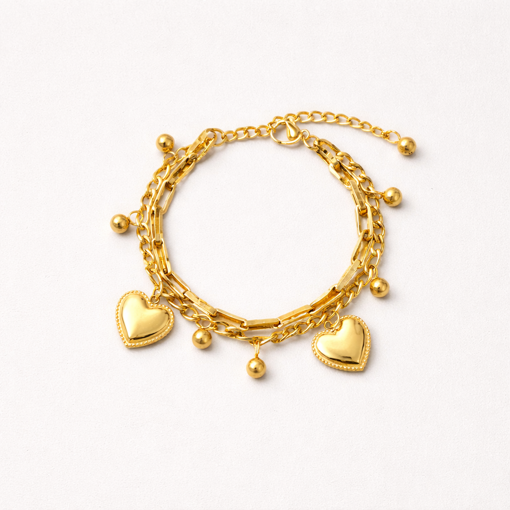 Pulsera Doble Corazones Dorado