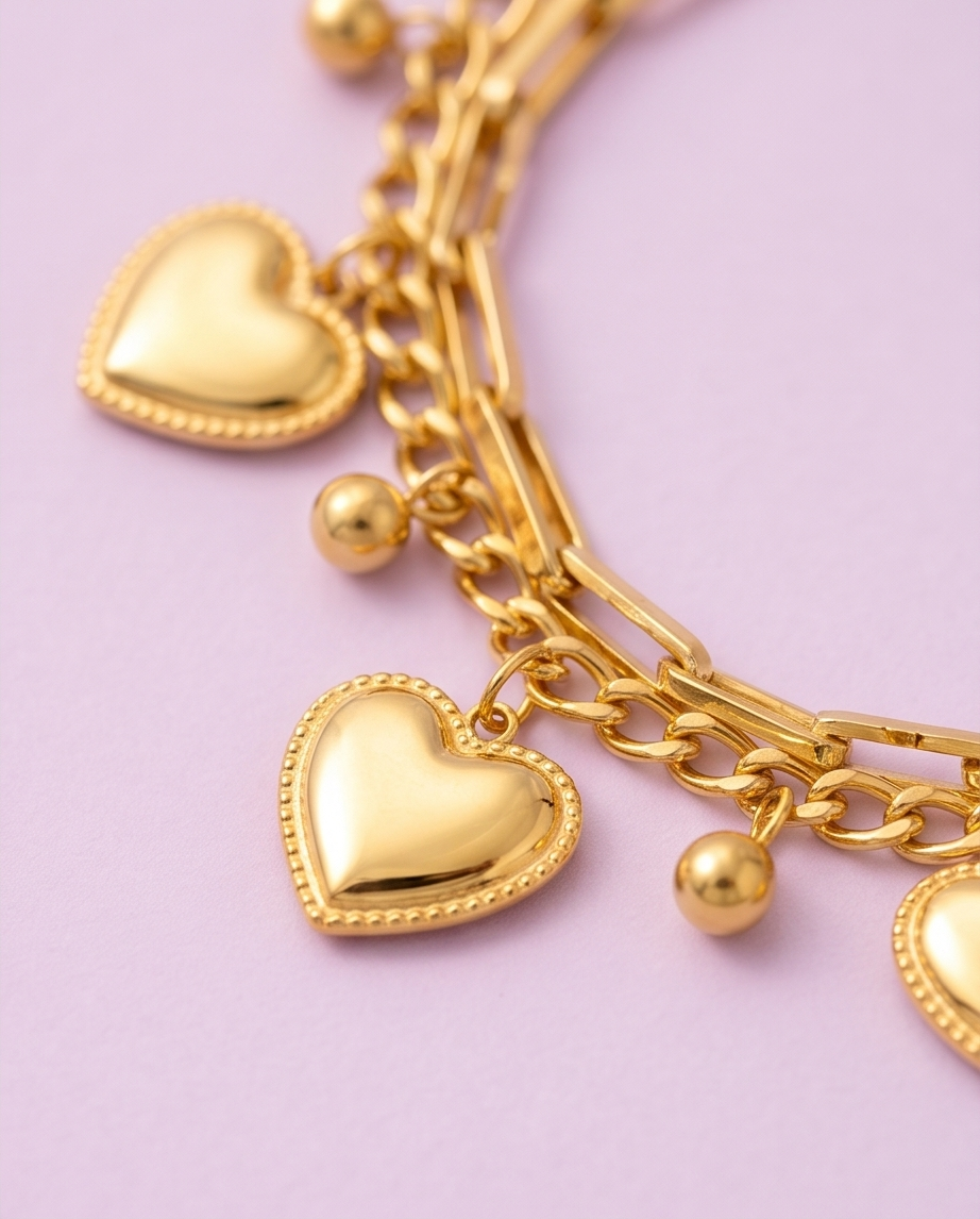 Pulsera Doble Corazones Dorado