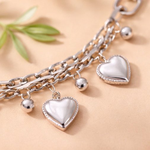 Pulsera Doble Corazones Plateado