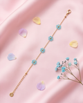 Pulsera Flores Azul Dorado